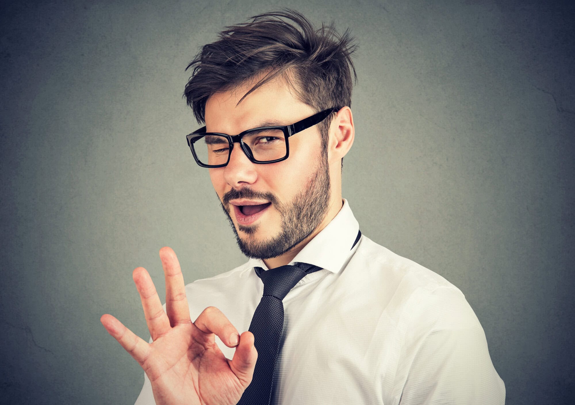 Ironic man showing OK gesture Don't trust the advice of every commission based salesperson.